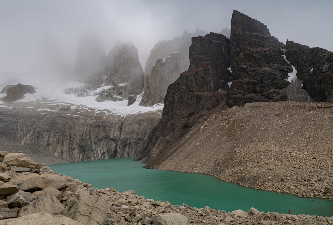 a mountain with a lake in the middle of it