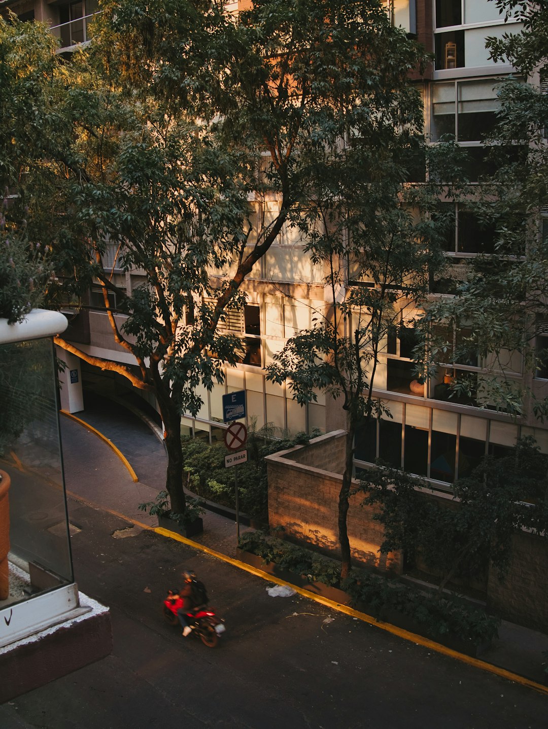 Affordable accommodations in Chile by Chile Vacay a motorcycle parked in front of a tall building