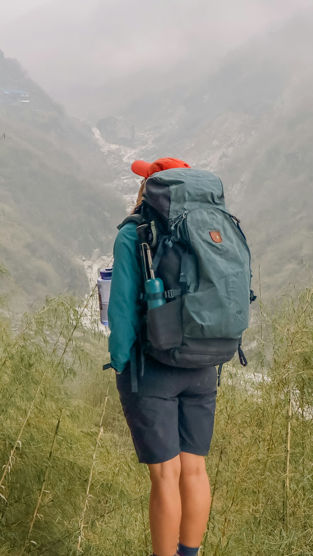 🤔 FAQs: Your Burning Chile Packing Questions Answered! by Chile Vacay a person with a backpack walking up a hill