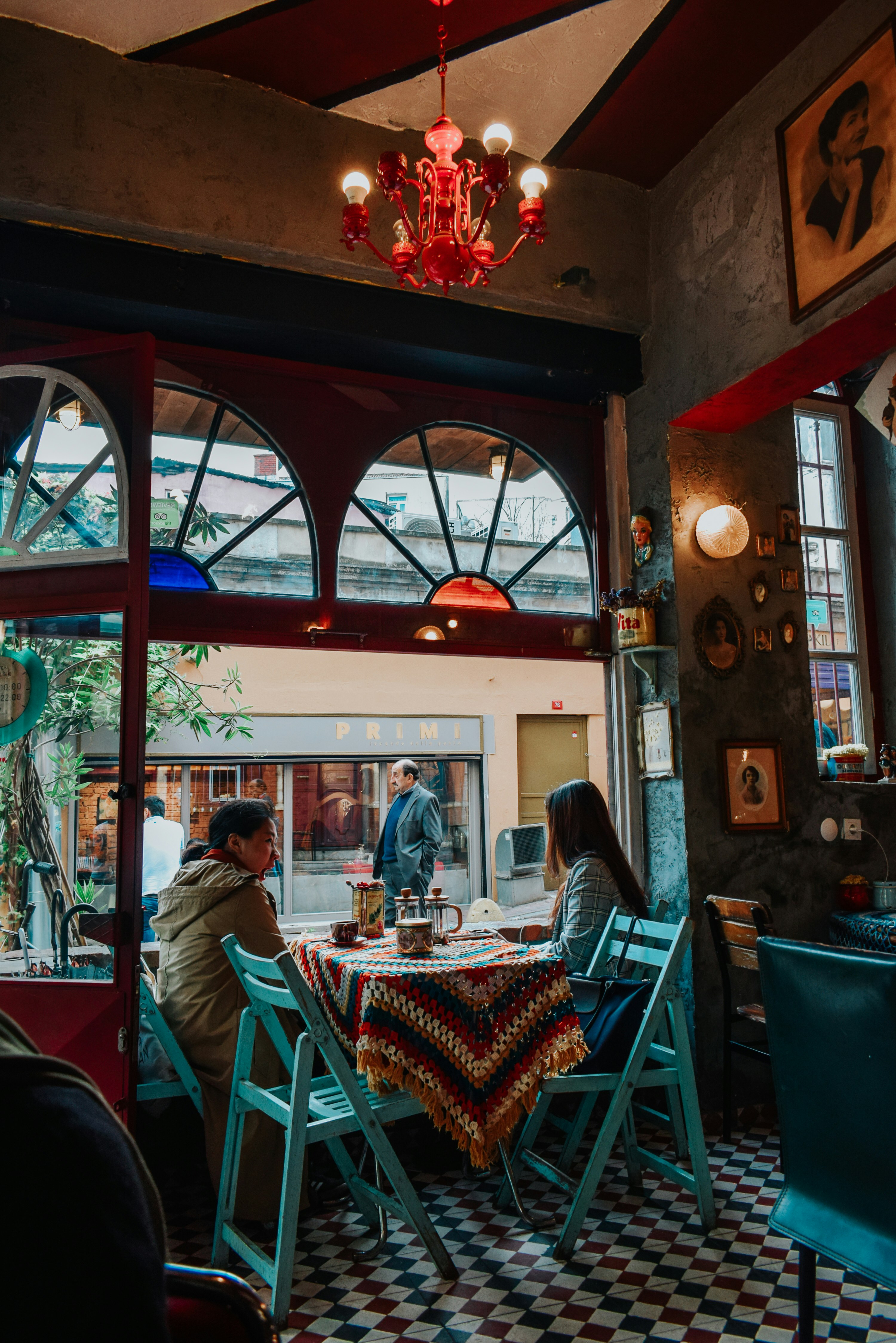 people sitting on chair inside restaurant