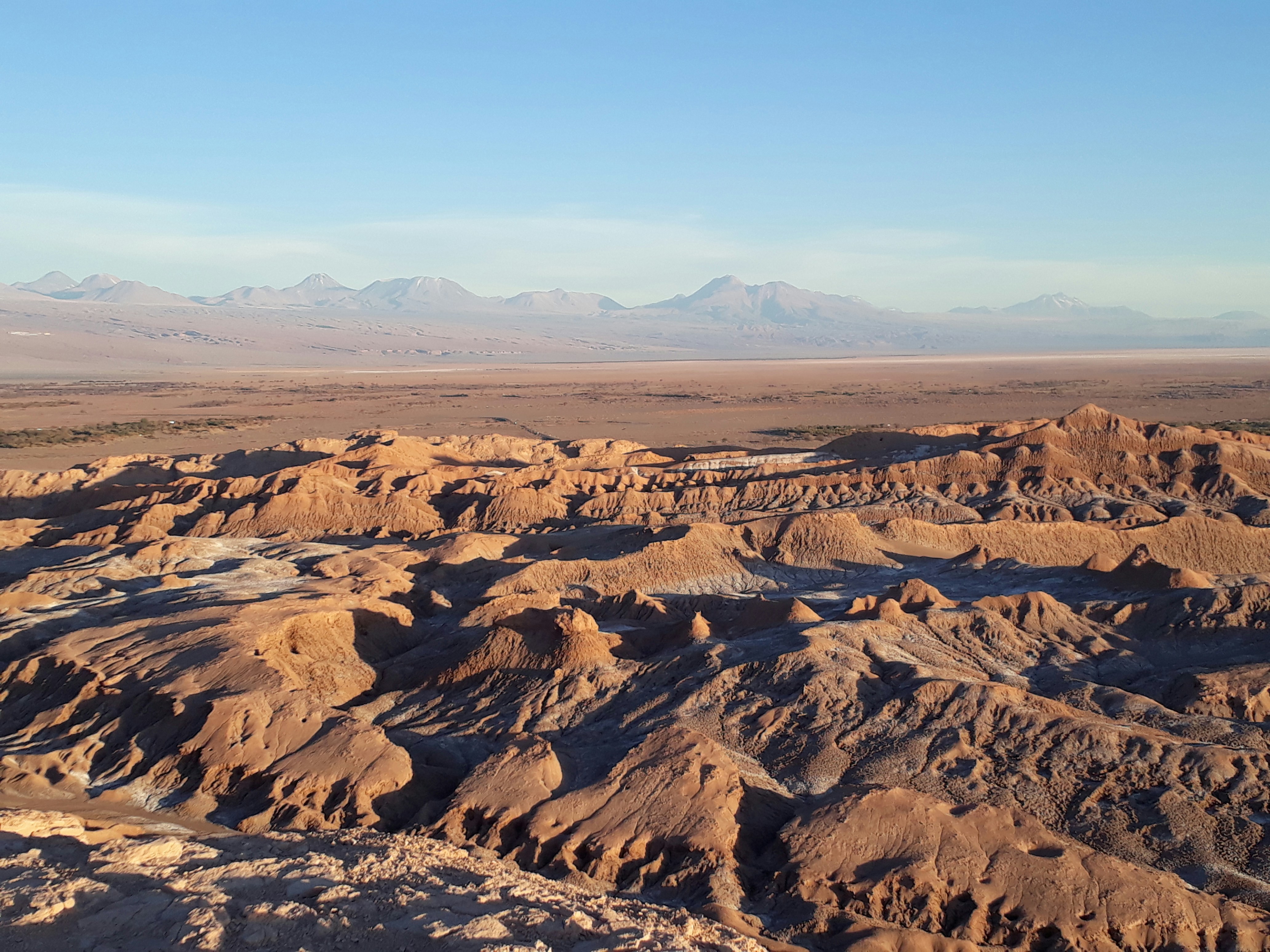 The Valley of the Moon received its name because its surface was believed to resemble that of the Moon; years later, after the man stepped on the moon, it was realized that the similarity was not so great, but the name remained and is known today: Vale da Lua. by Chile Vacay brown and black mountains under blue sky during daytime